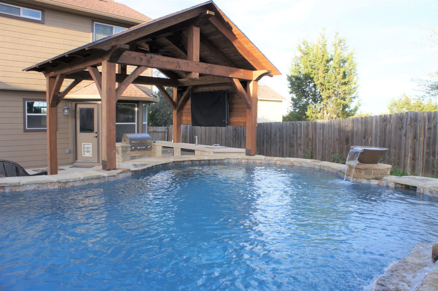 17’ x 14’, cedar pavilion, king post, residential, barbeque or grill, kitchen or outdoor kitchen, residential, covered patio, poolside or swimming pool, cabana, back wall, outdoor living, entertaining, Dripping Springs, Austin