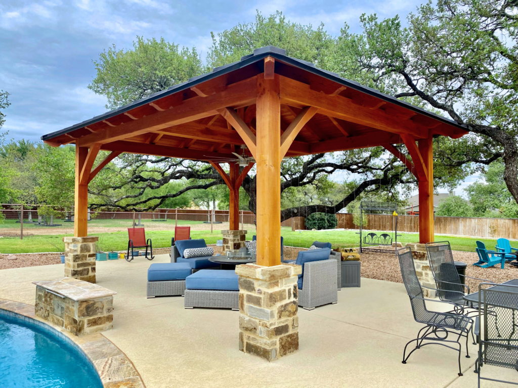 Waco, 14x18, heavy timbers, standing seam metal roof or R panel metal roof, douglas fir, HIP, elegant pavilion, outdoor living, entertaining, pavilion with patio furniture, poolside or swimming pool, cabana, free standing pavilion, builder/contractor, wood pergola kit