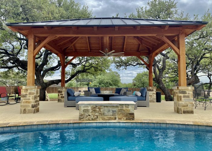 Waco, 14x18, heavy timbers, standing seam metal roof or R panel metal roof, douglas fir, HIP, elegant pavilion, outdoor living, entertaining, pavilion with patio furniture, poolside or swimming pool, cabana, free standing pavilion, builder/contractor, wood pergola kit