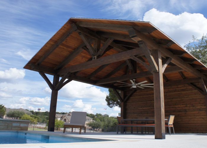 16 x 16, cantilever, half hip, poolside or swimming pool, cabana, entertaining, outdoor living, timber frame pavilion, pavilion with wall, prefab, free standing pavilion, Austin, spicewood, hill country pavilions, heavy timbers